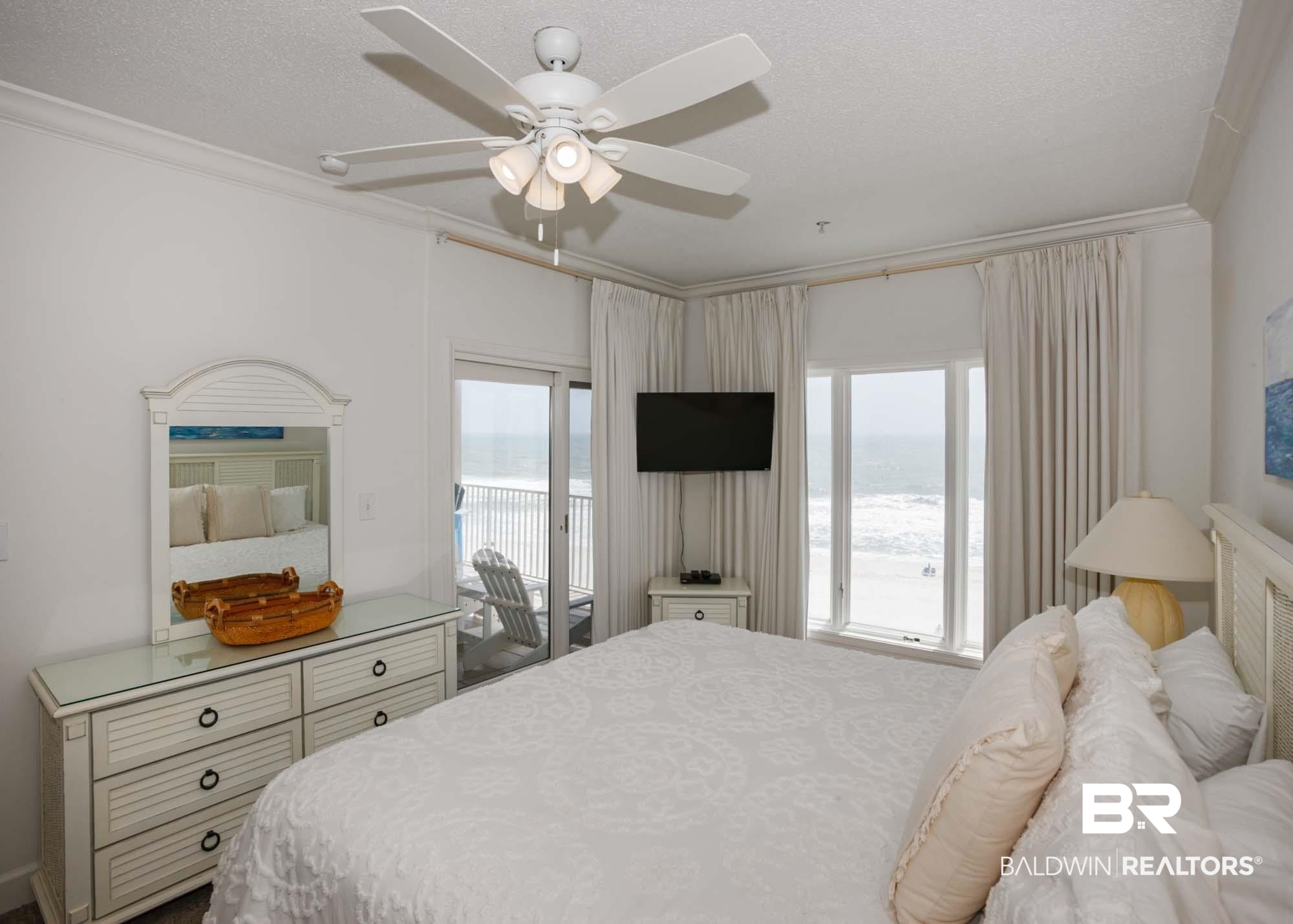 28910 Perdido Beach Boulevard, Unit 4B Orange Beach, AL 36561 - Photo 20 of 48 Bedroom with a ceiling fan, crown molding, access to outside, and a textured ceiling