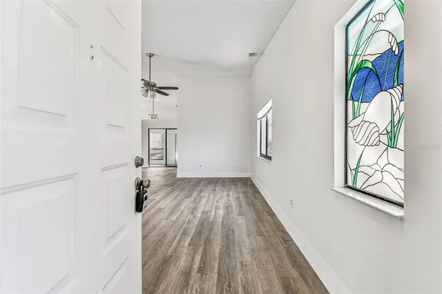 an empty room with windows