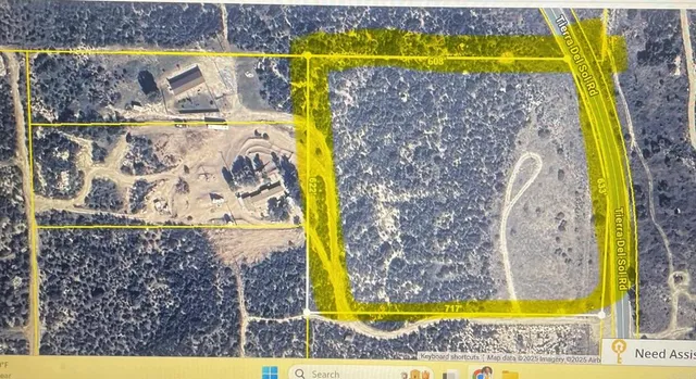 a view of swimming pool with a yard