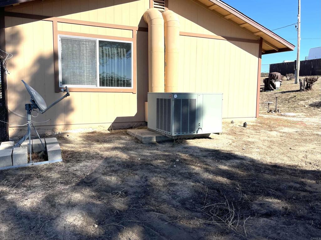 1902 Tierra Del Sol Road Boulevard, CA 91905 - Photo 4 of 37 a view of a backyard of the house