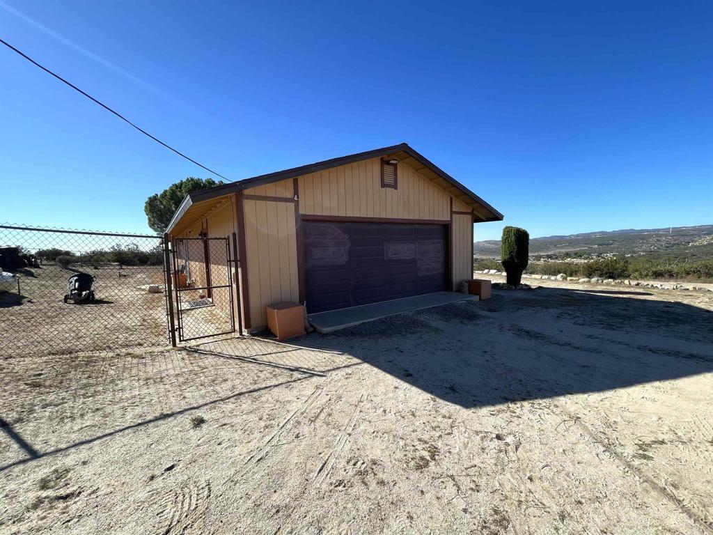 1902 Tierra Del Sol Road Boulevard, CA 91905 - Photo 6 of 37 a view of a backyard of the house