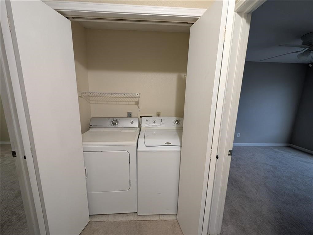 6702 Everhart Road, Unit S104 Corpus Christi, TX 78413 - Photo 16 of 22 a utility room with dryer and washer
