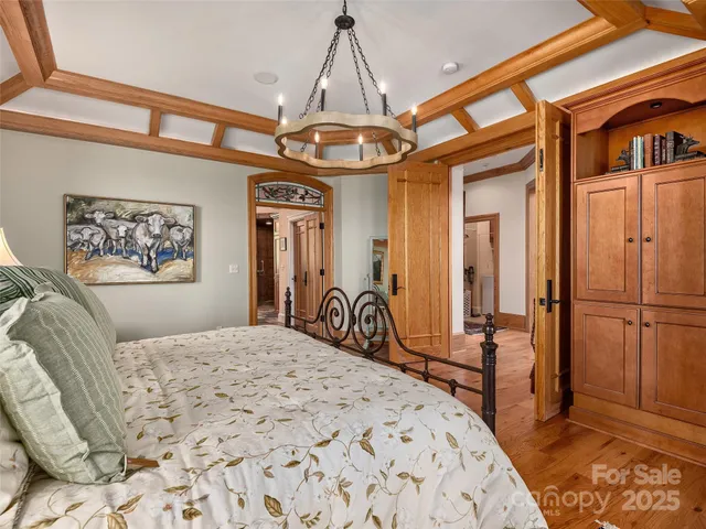 a room with kitchen island granite countertop furniture and stainless steel appliances