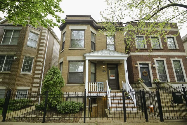 1721 West Nelson Street, Unit CH3 Chicago, IL 60657 - Photo 1 of 20 a front view of a multi story residential apartment building