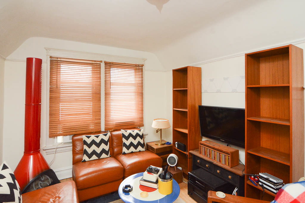 1721 West Nelson Street, Unit CH3 Chicago, IL 60657 - Photo 11 of 20 a living room with furniture and a flat screen tv