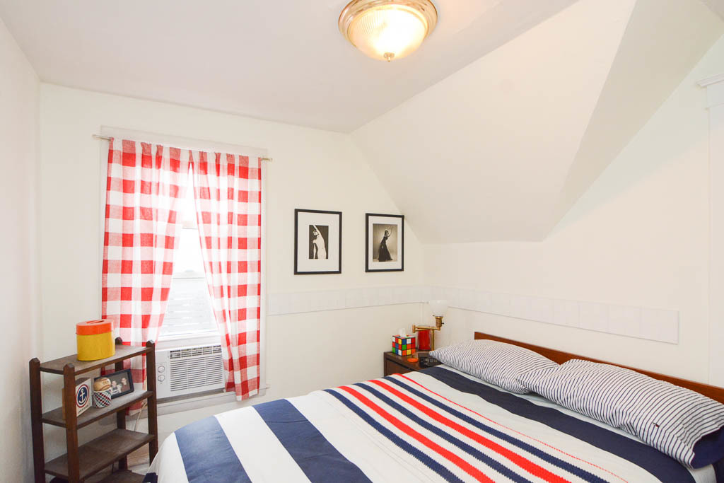 1721 West Nelson Street, Unit CH3 Chicago, IL 60657 - Photo 15 of 20 a bedroom with bed and a window