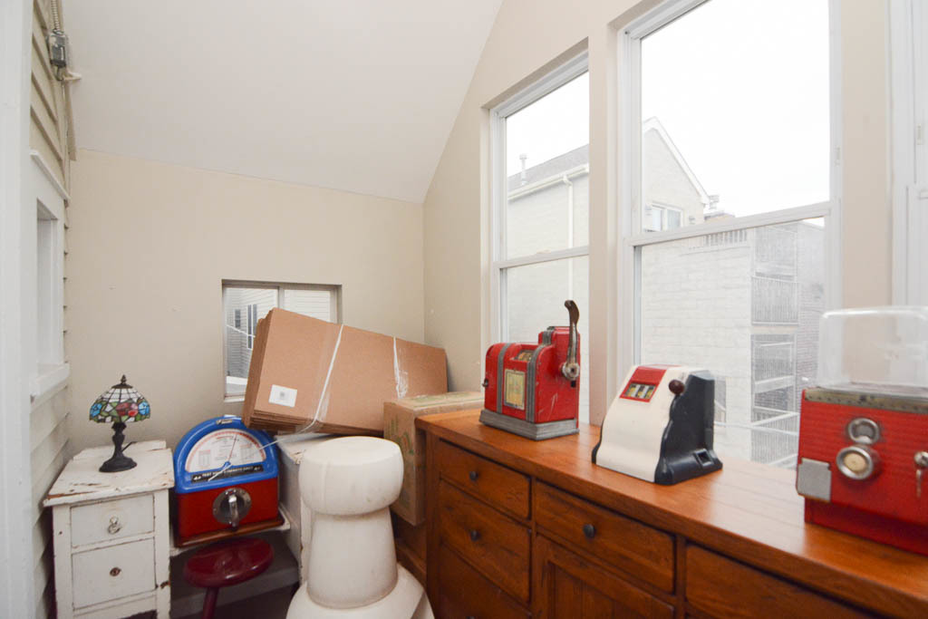 1721 West Nelson Street, Unit CH3 Chicago, IL 60657 - Photo 20 of 20 a bathroom with a toilet sink and mirror