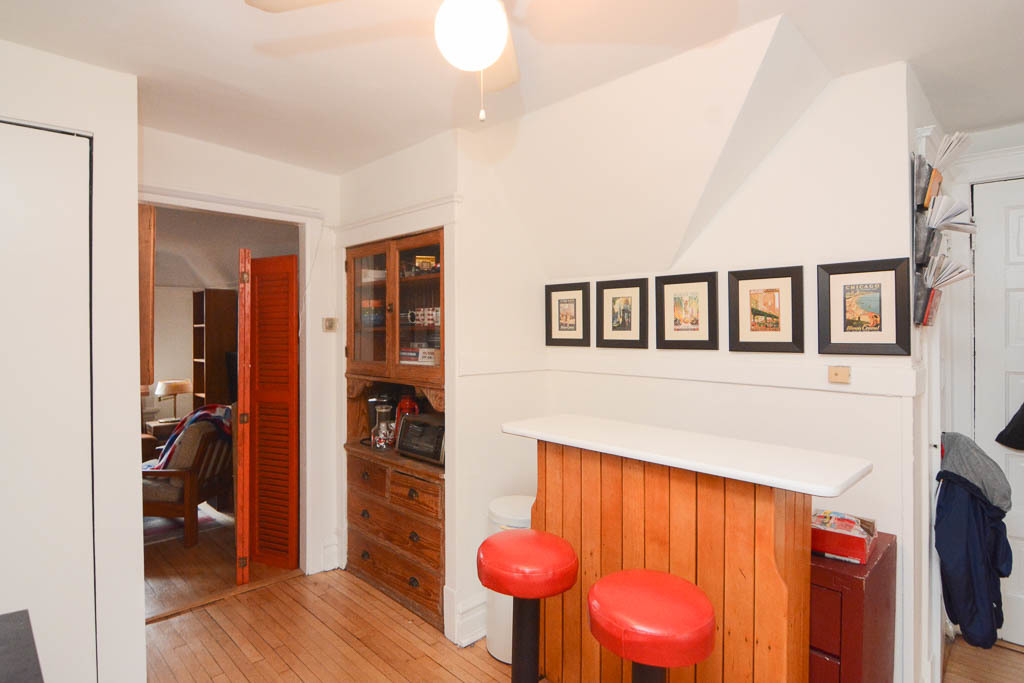 1721 West Nelson Street, Unit CH3 Chicago, IL 60657 - Photo 5 of 20 a view of a living room with furniture and wooden floor
