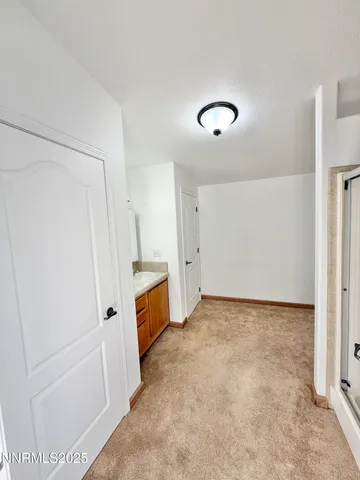 a view of a room with an empty space