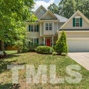 7604 Rambeau Circle Raleigh, NC 27613 - Photo 2 of 25 a front view of a house with a yard
