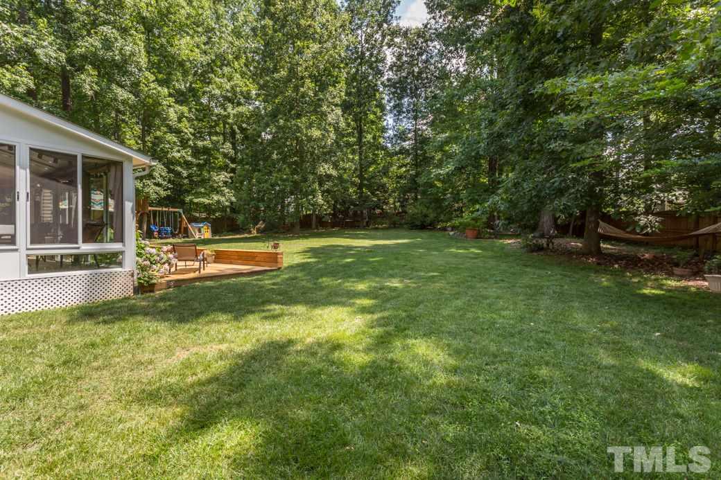 7604 Rambeau Circle Raleigh, NC 27613 - Photo 24 of 25 a view of a house with a big yard