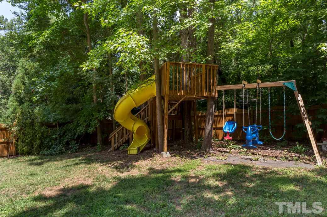 7604 Rambeau Circle Raleigh, NC 27613 - Photo 25 of 25 a view of a park with slide and swing