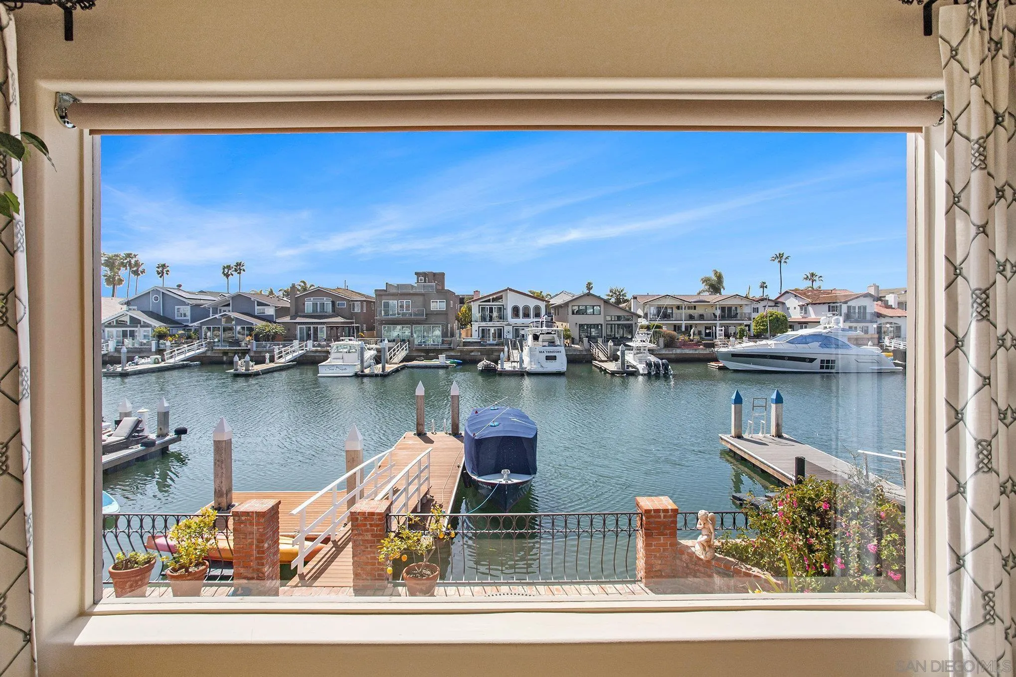 34 The Point Coronado, CA 92118 - Photo 15 of 71 a view of a lake from a balcony