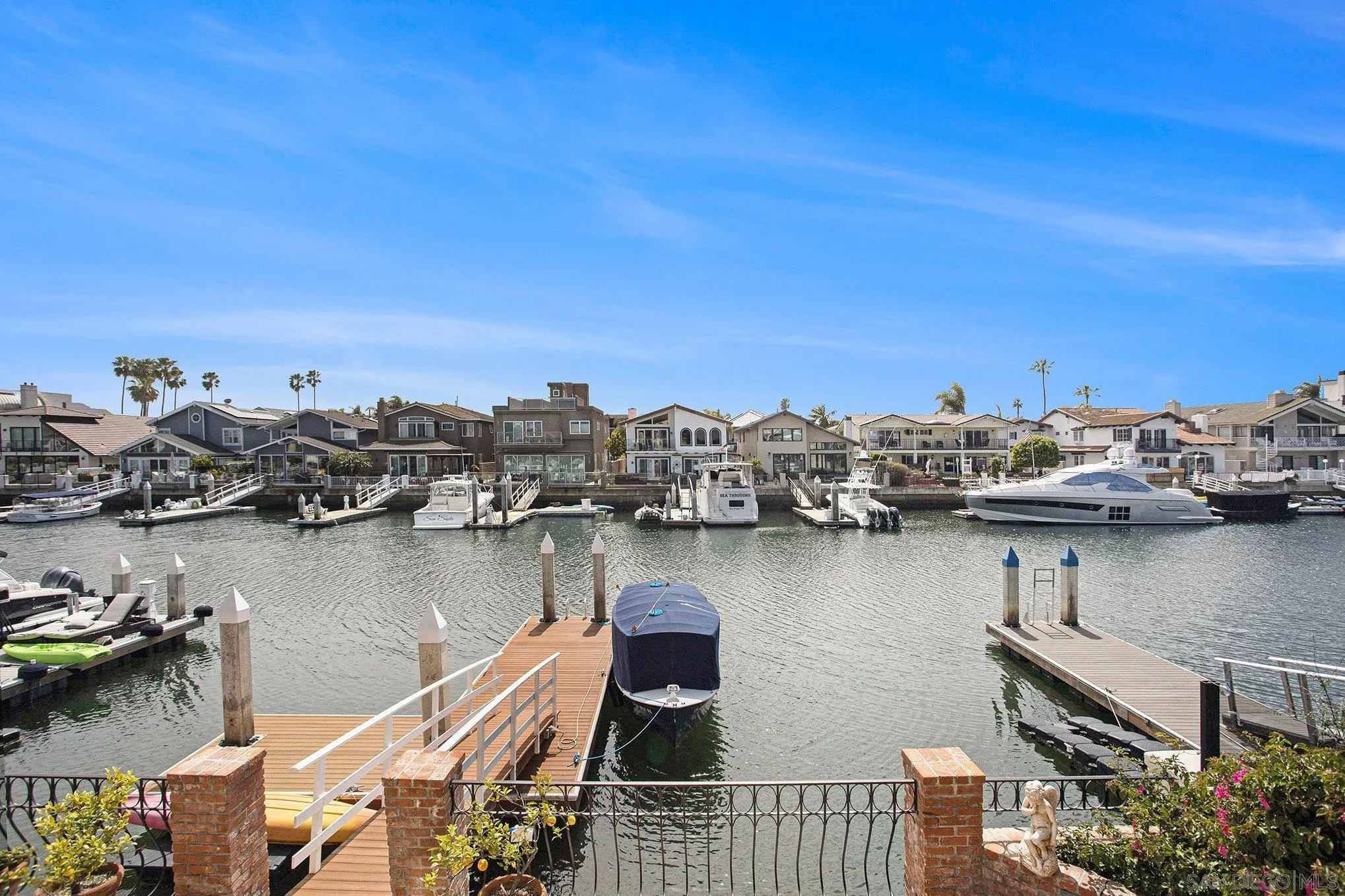 34 The Point Coronado, CA 92118 - Photo 2 of 71 a view of a ocean with boats and trees in the background