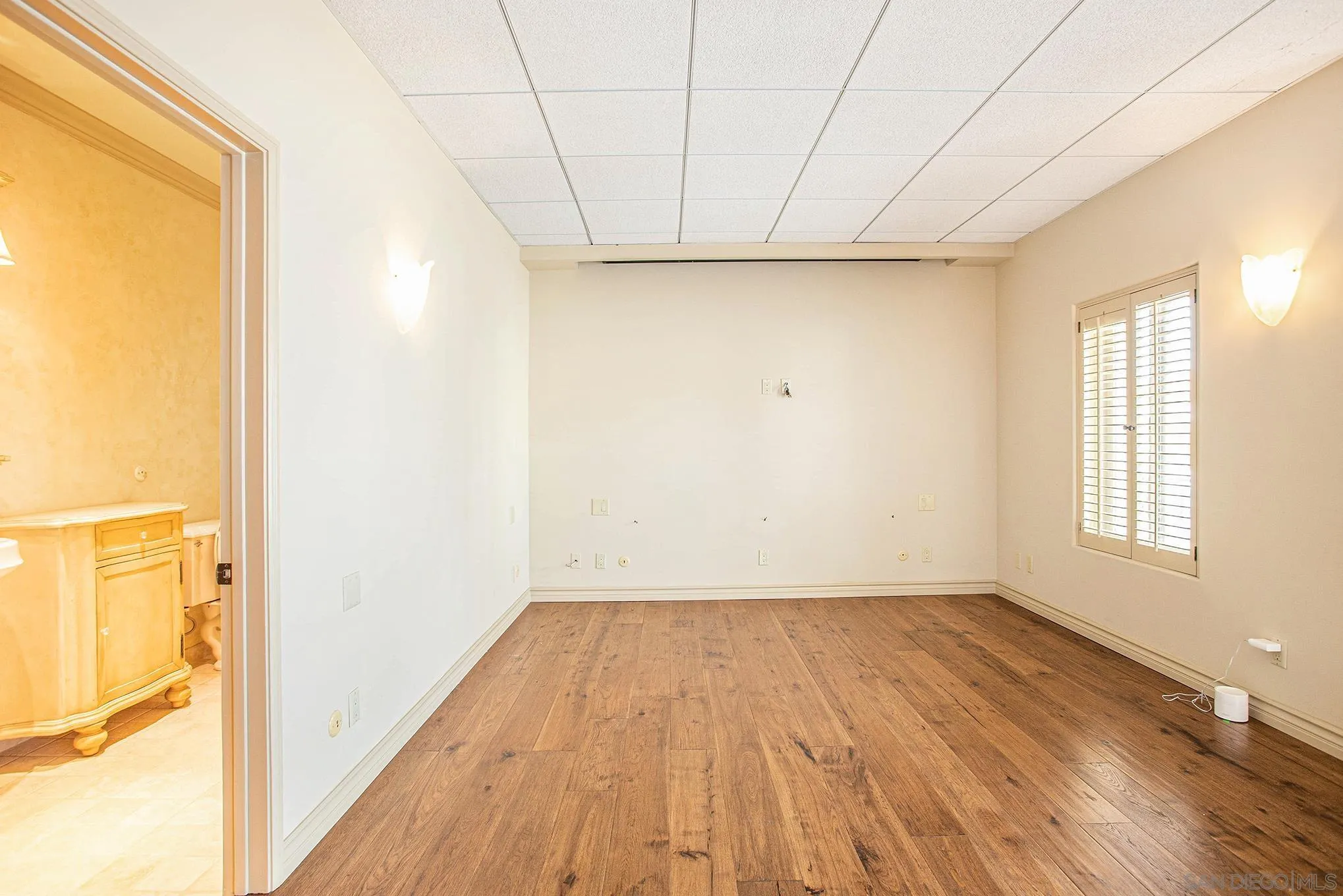 34 The Point Coronado, CA 92118 - Photo 23 of 71 a view of a room with wooden floor and a window