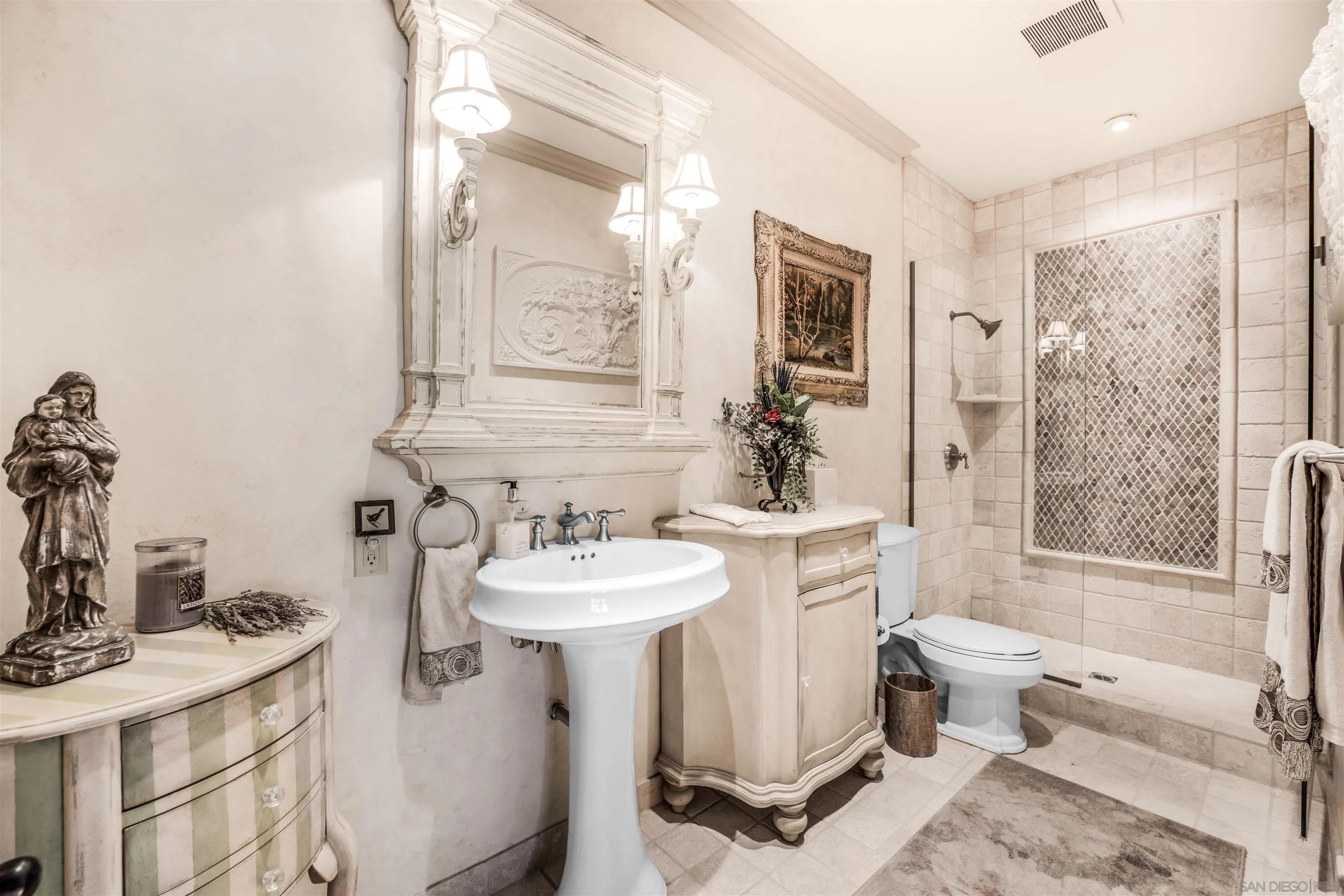 34 The Point Coronado, CA 92118 - Photo 27 of 71 a bathroom with a sink toilet and shower