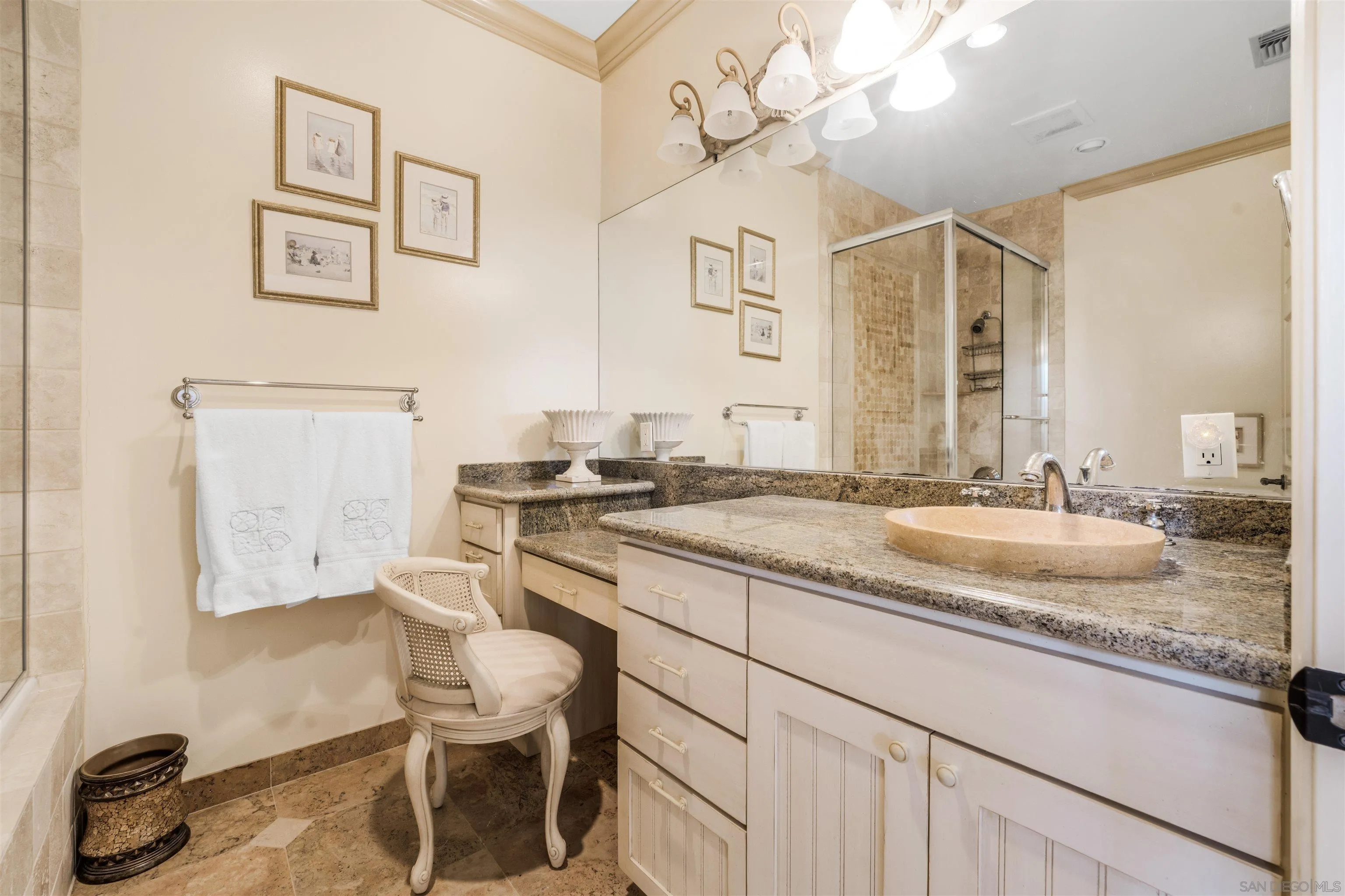 34 The Point Coronado, CA 92118 - Photo 31 of 71 a bathroom with a granite countertop sink and a mirror