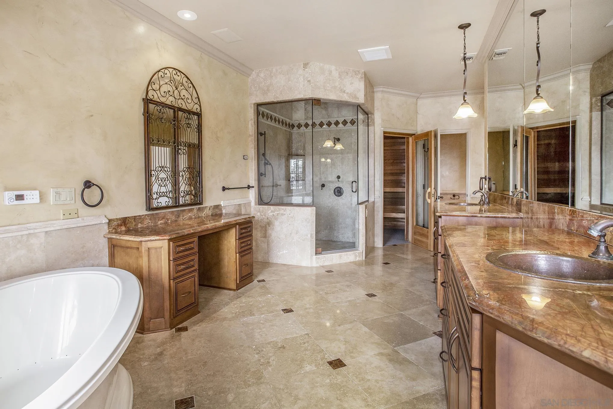 34 The Point Coronado, CA 92118 - Photo 48 of 71 a large kitchen with a sink a counter top space stainless steel appliances and cabinets