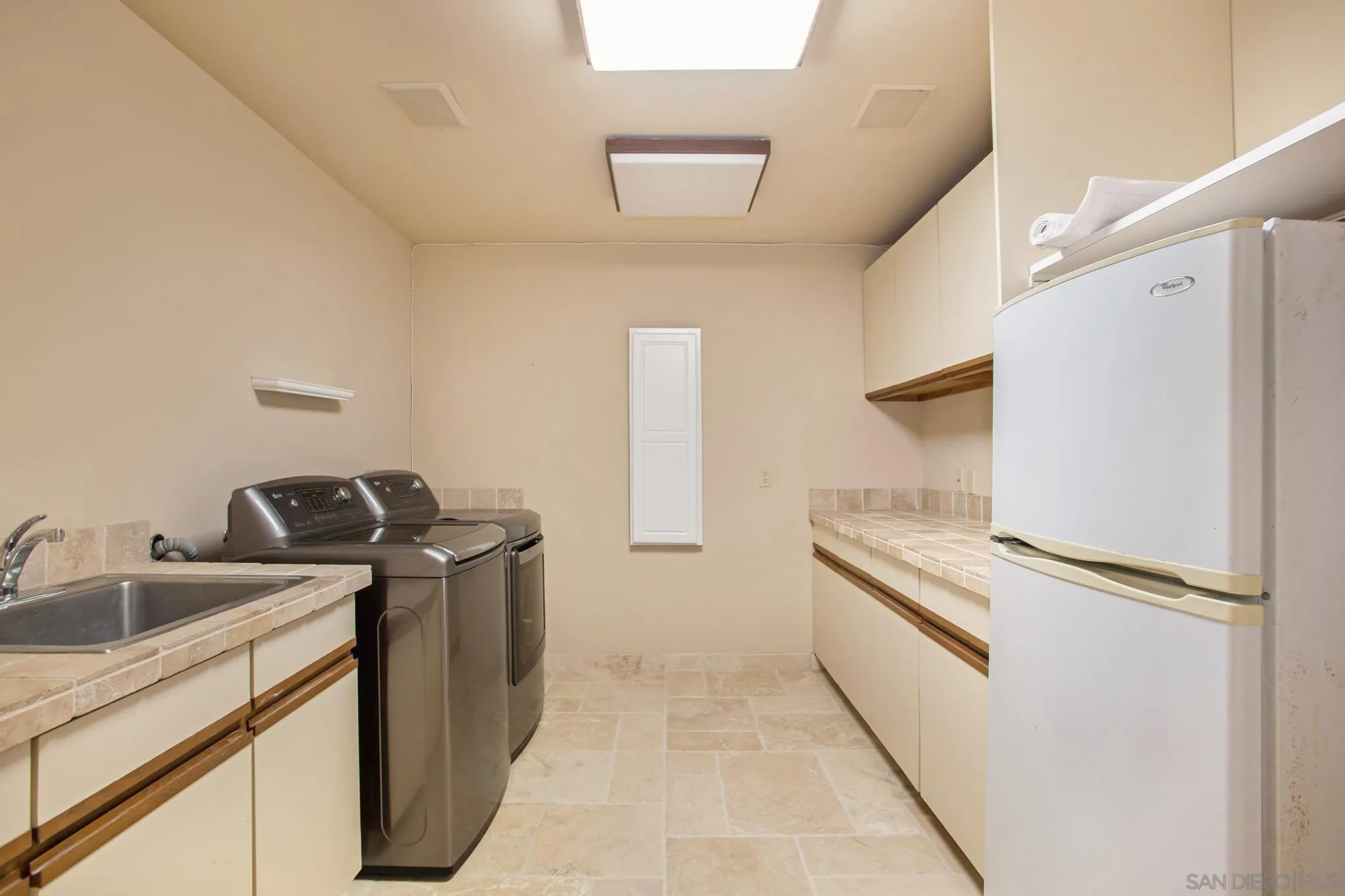 34 The Point Coronado, CA 92118 - Photo 55 of 71 a kitchen with a stove and a refrigerator