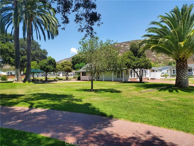 a view of a house with a big yard
