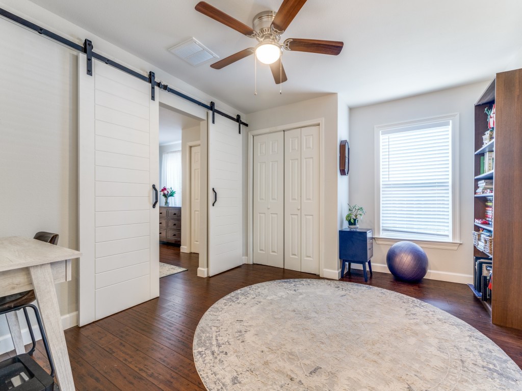 5110 Cochran Street Houston, TX 77009 - Photo 14 of 23 a bedroom with furniture and window