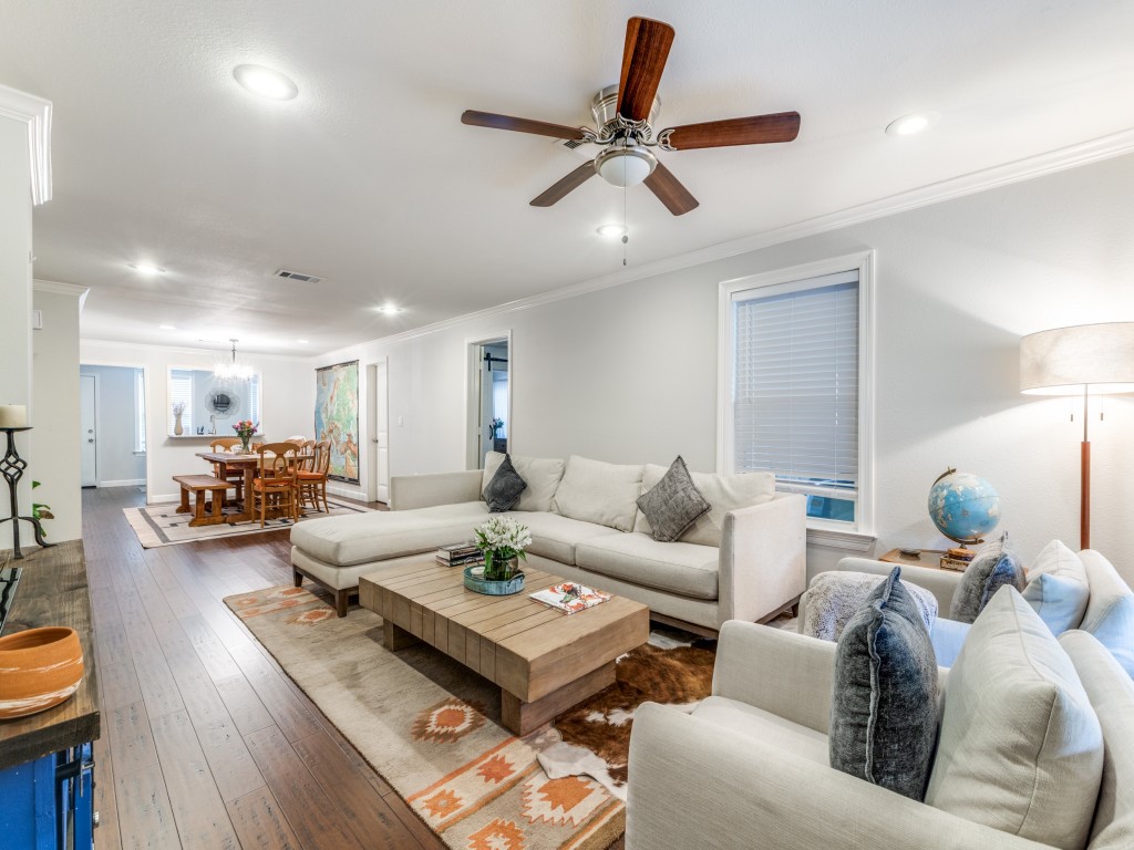 5110 Cochran Street Houston, TX 77009 - Photo 3 of 23 a living room with furniture and a wooden floor