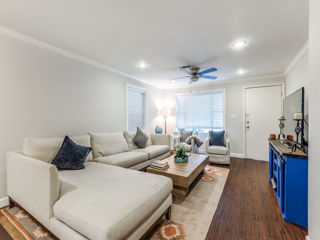 5110 Cochran Street Houston, TX 77009 - Photo 4 of 23 a living room with furniture and a flat screen tv