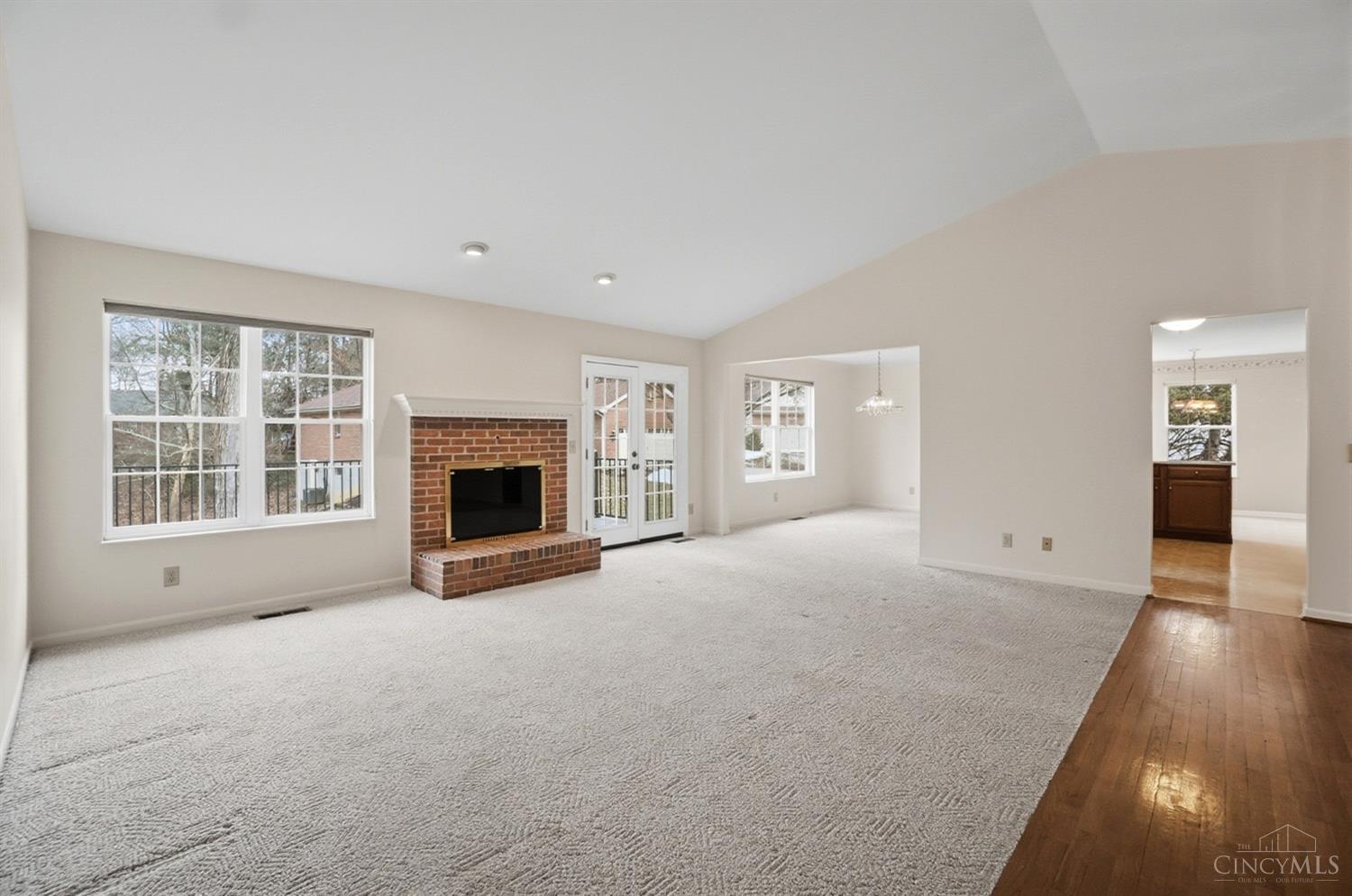 1090 West Galbraith Road Cincinnati, OH 45231 - Photo 6 of 37 The living room is open to the dining room, great for entertaining.