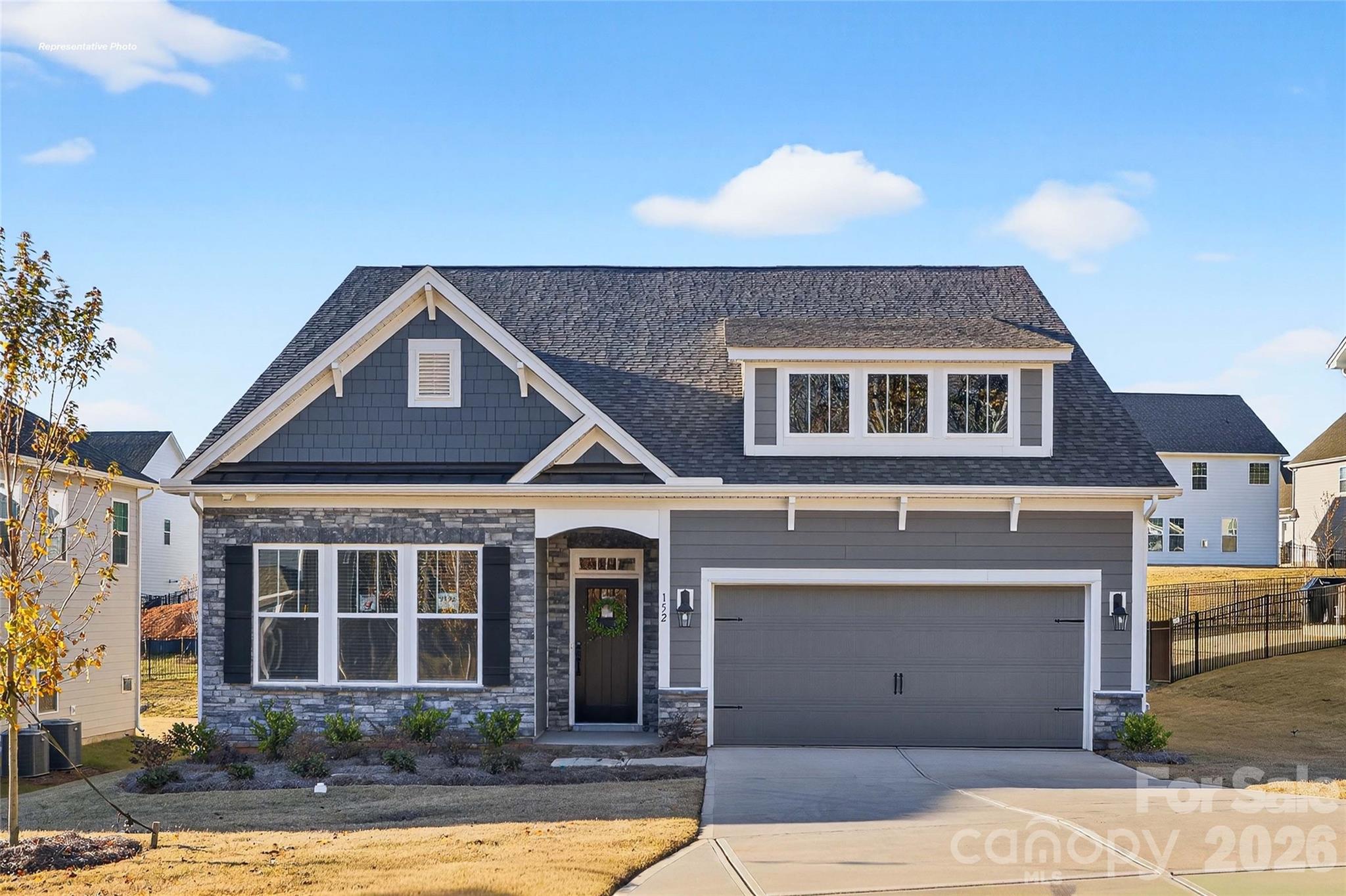 7565 Bainbridge Road Sherrills Ford, NC 28673 - Photo 1 of 24 a front view of a house with a yard