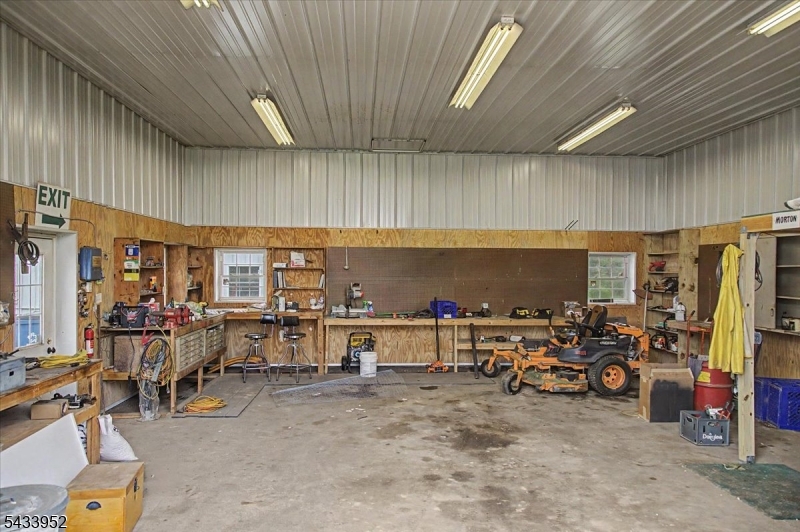 80 Valley Crest Road Annandale, NJ 08801 - Photo 16 of 42 a view of a garage with furniture