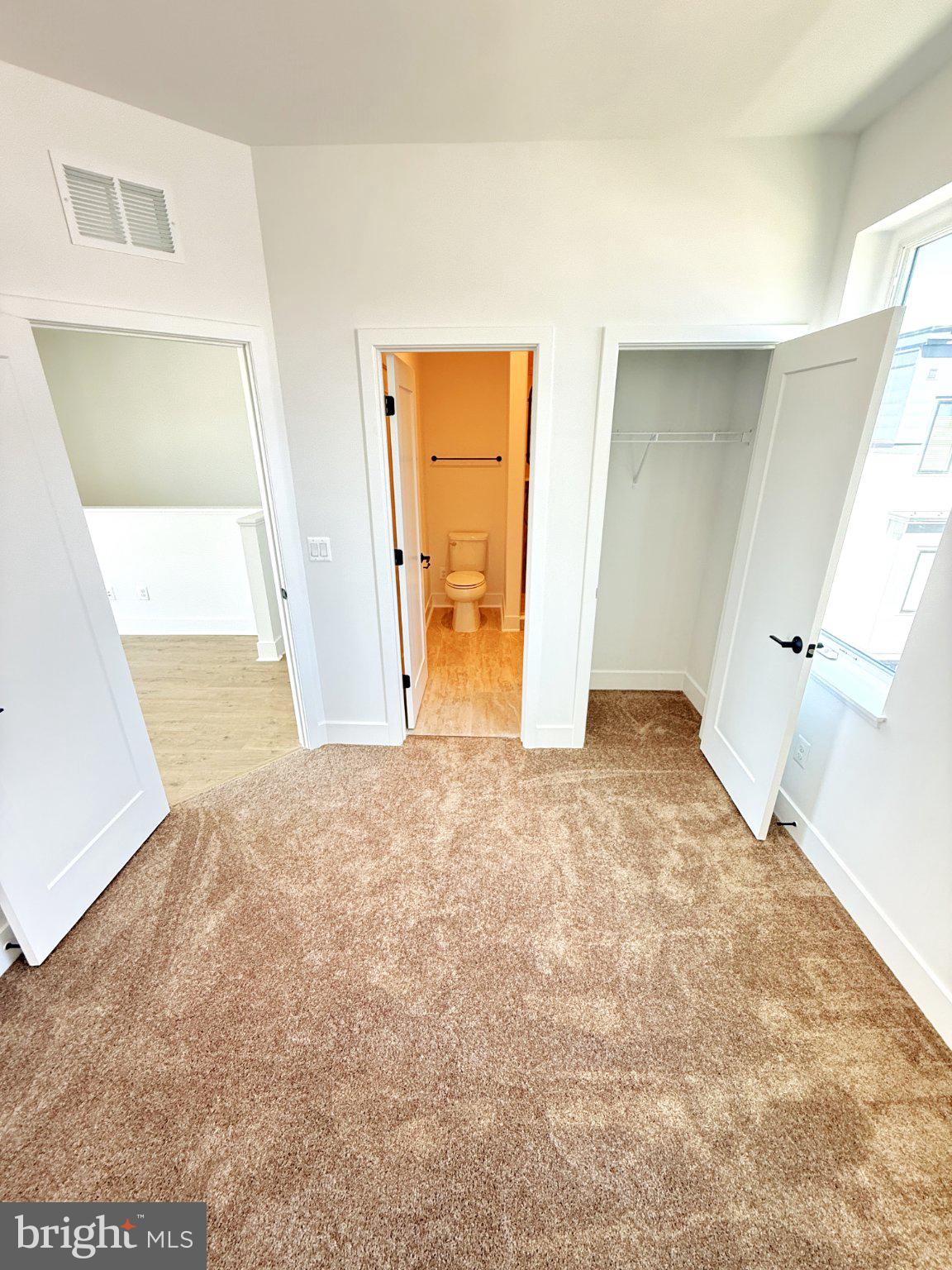 33 Lower Service Court Northwest Washington, DC 20001 - Photo 43 of 51 Bright and airy room with cozy carpet.