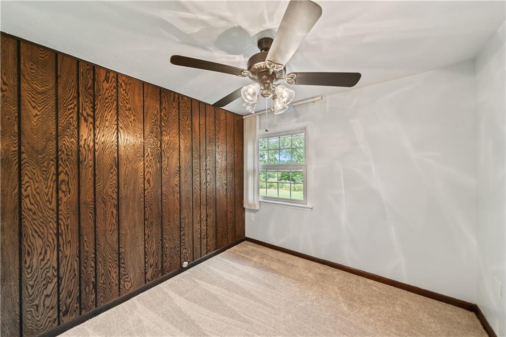 185 Reed Road Avella, PA 15312 - Photo 16 of 50 a view of an empty room with a window
