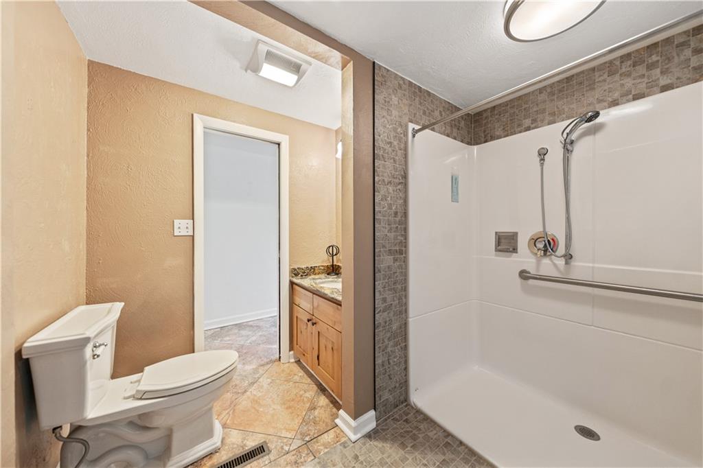 185 Reed Road Avella, PA 15312 - Photo 17 of 50 a bathroom with a toilet and shower