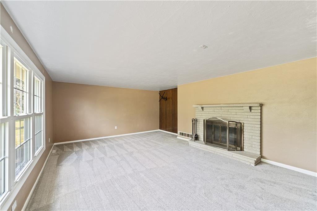 185 Reed Road Avella, PA 15312 - Photo 19 of 50 an empty room with fireplace