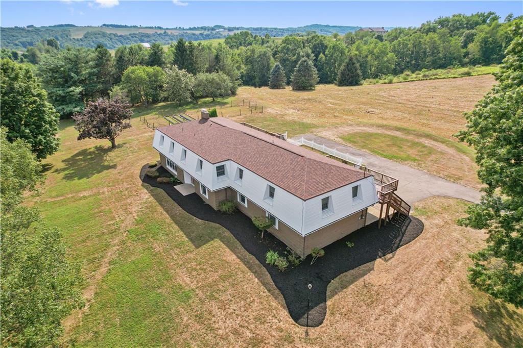 185 Reed Road Avella, PA 15312 - Photo 2 of 50 a view of a ocean with a yard