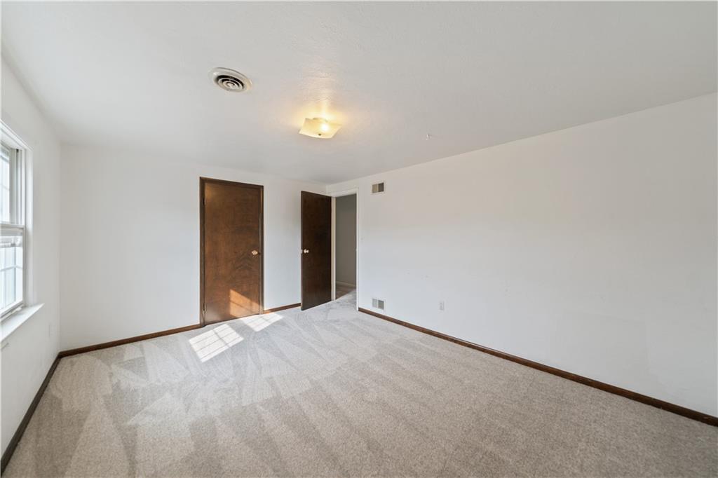 185 Reed Road Avella, PA 15312 - Photo 29 of 50 a view of an empty room with a window