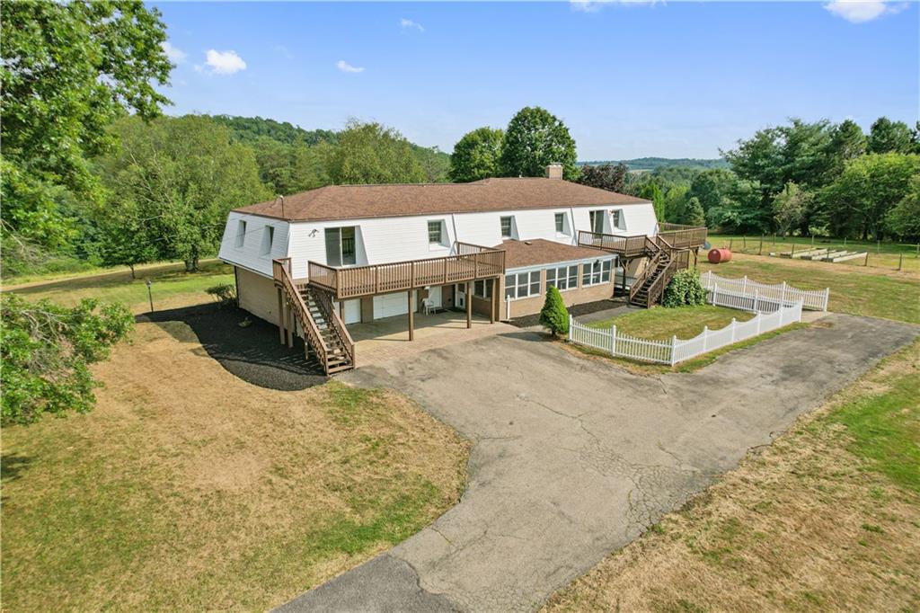 185 Reed Road Avella, PA 15312 - Photo 3 of 50 a front view of a house with a yard