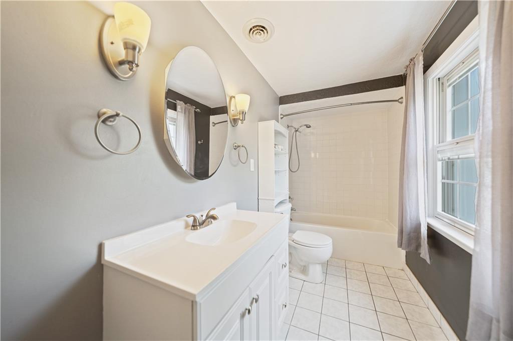 185 Reed Road Avella, PA 15312 - Photo 39 of 50 a bathroom with a toilet sink and mirror