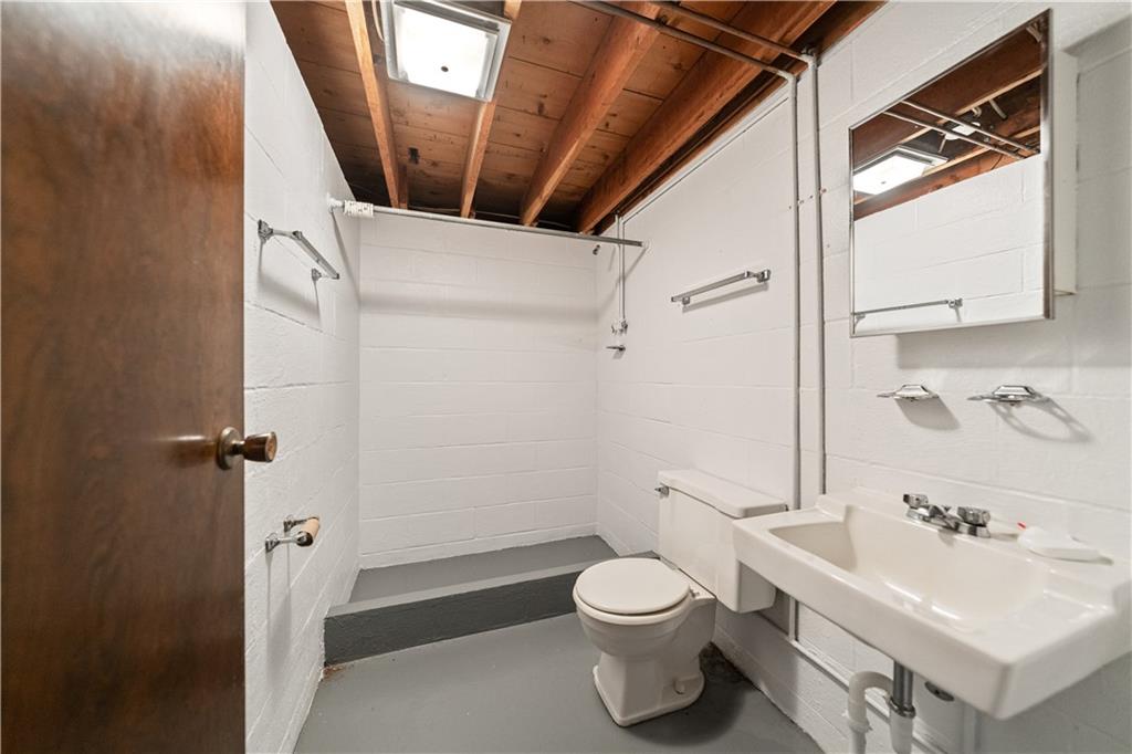 185 Reed Road Avella, PA 15312 - Photo 41 of 50 a bathroom with a sink a toilet and shower