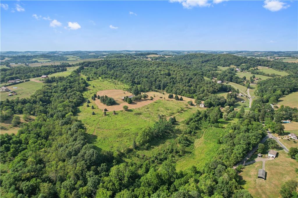 185 Reed Road Avella, PA 15312 - Photo 48 of 50 a view of a city with lush green forest