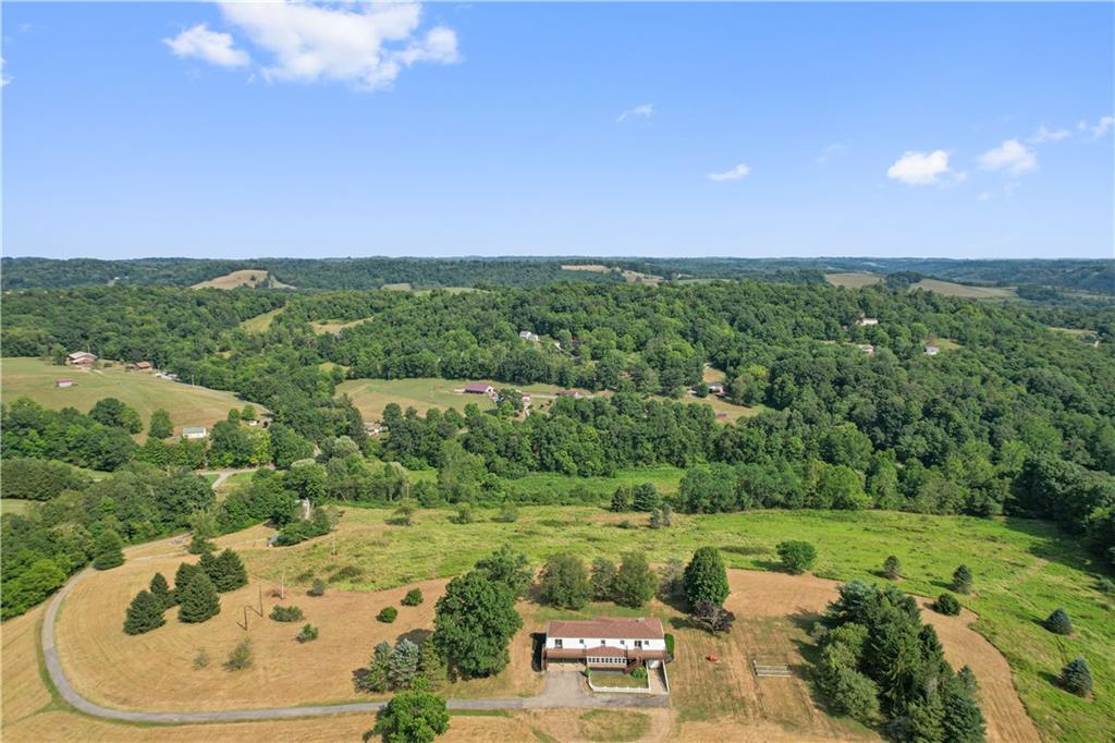 185 Reed Road Avella, PA 15312 - Photo 5 of 50 a view of a lake with a city