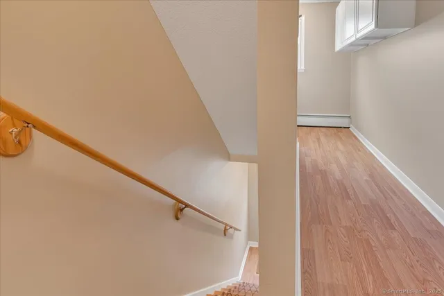a view of entryway with wooden floor