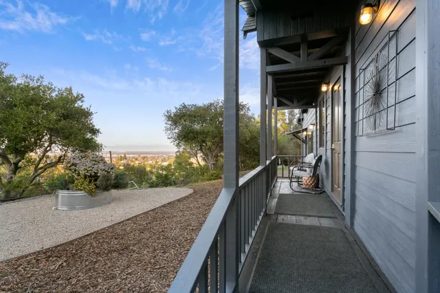 a balcony with furniture