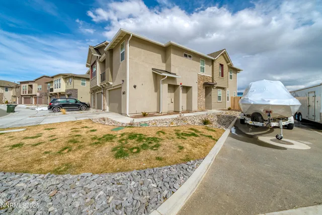 a swimming pool with outdoor seating and yard
