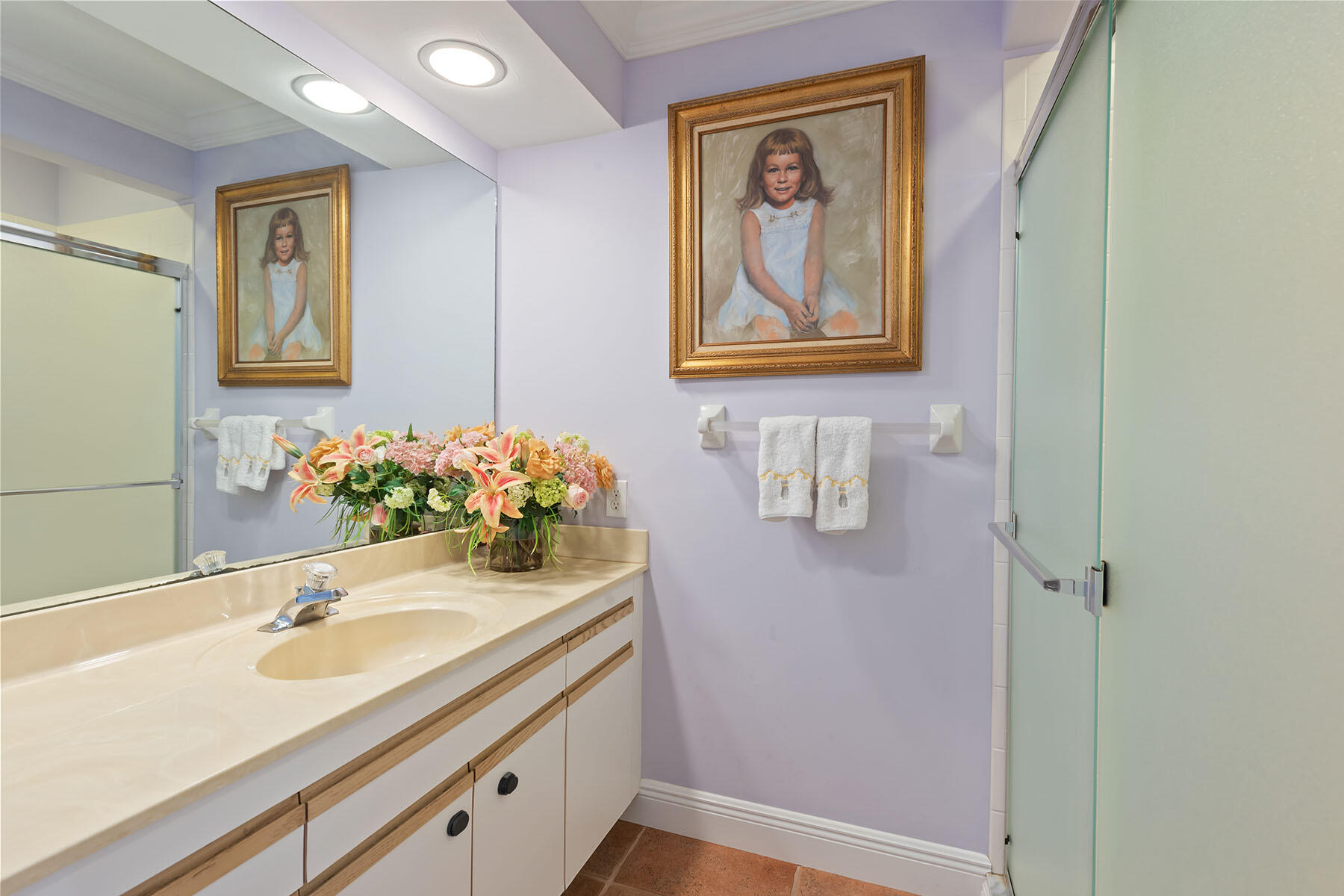 792 Eagle Creek Drive, Unit 204 Naples, FL 34113 - Photo 15 of 49 a bathroom with a sink and a mirror