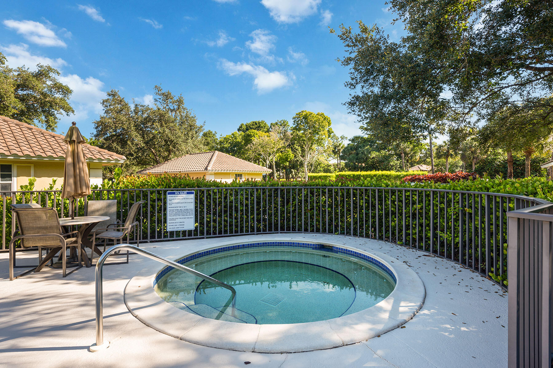 792 Eagle Creek Drive, Unit 204 Naples, FL 34113 - Photo 22 of 49 a view of a swimming pool with a patio