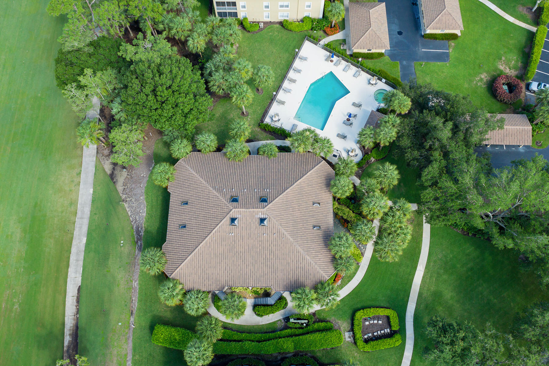 792 Eagle Creek Drive, Unit 204 Naples, FL 34113 - Photo 33 of 49 an aerial view of a house with outdoor space and street view