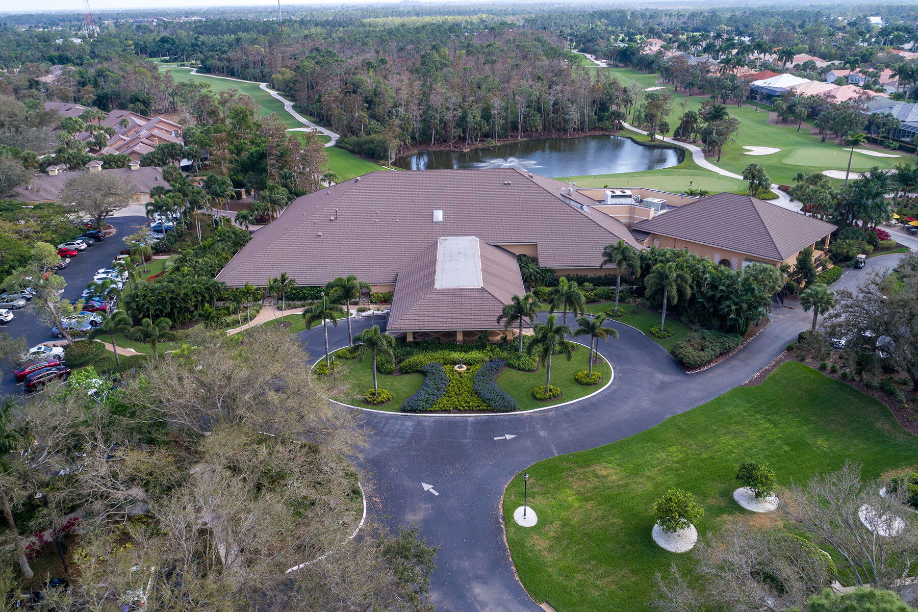 792 Eagle Creek Drive, Unit 204 Naples, FL 34113 - Photo 40 of 49 an aerial view of a house with garden