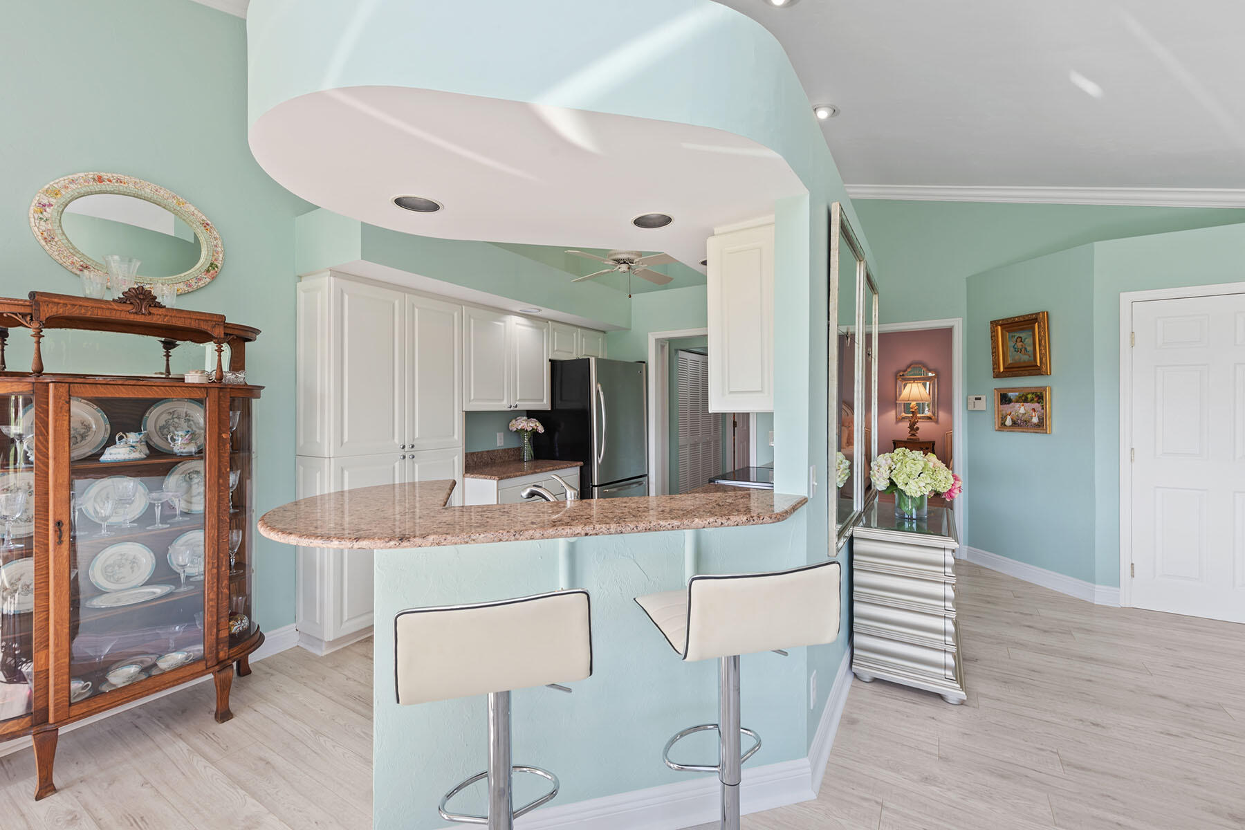 792 Eagle Creek Drive, Unit 204 Naples, FL 34113 - Photo 4 of 49 a dining room with furniture and window
