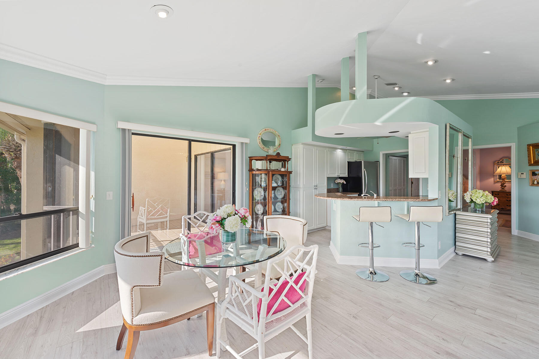 792 Eagle Creek Drive, Unit 204 Naples, FL 34113 - Photo 7 of 49 a dining room with furniture and window